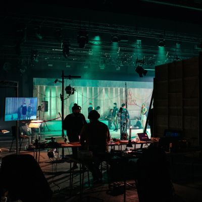 Production Arts students working backstage during a technical rehearsal